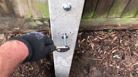 fix concrete fence post repair